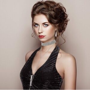 Costume jewelry silver colored rhinestone choker with body chain